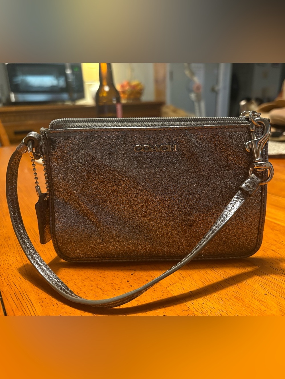 COACH Metallic Brown Wristlet Clutch with Gold Logo
